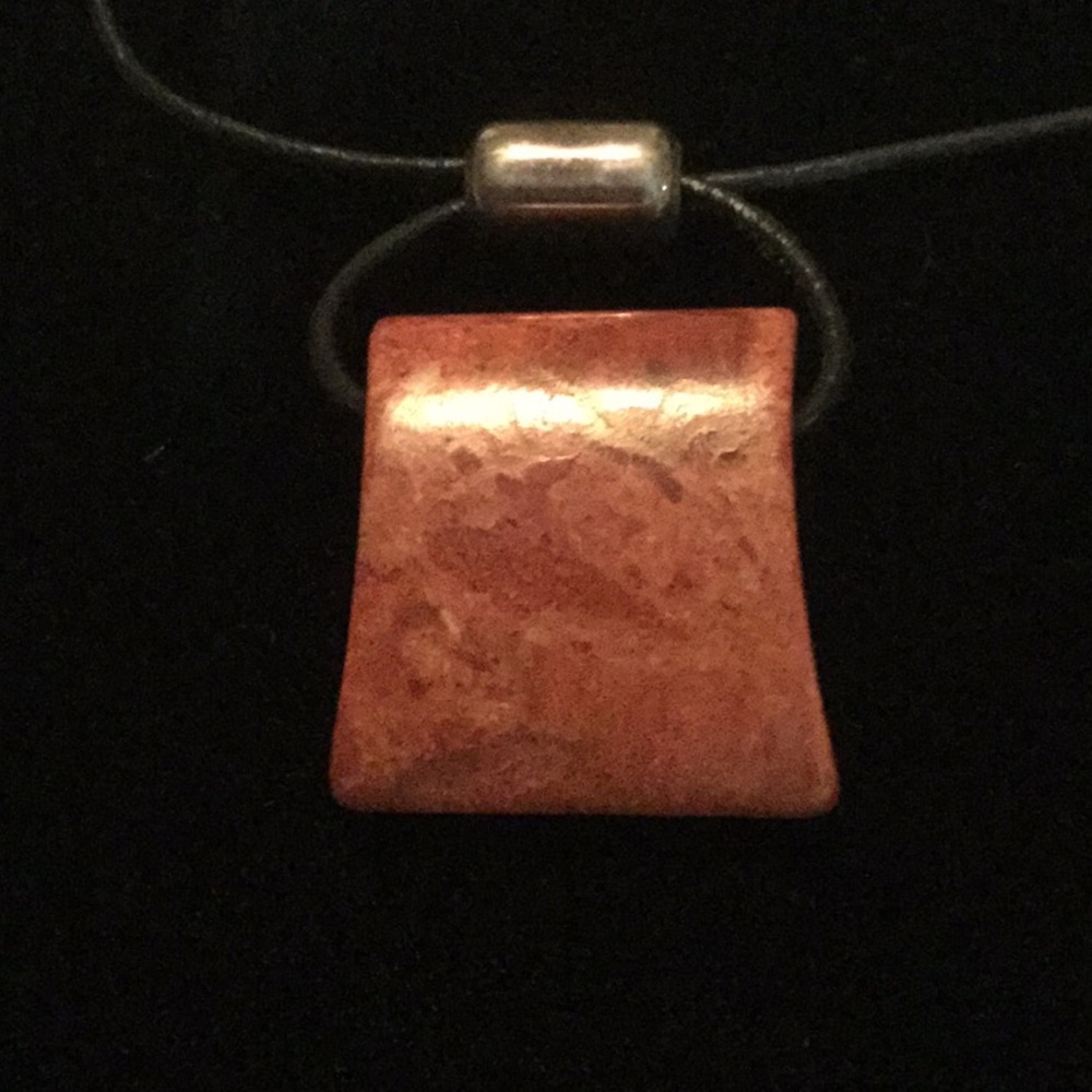 Silpada black leather with dark orange stone